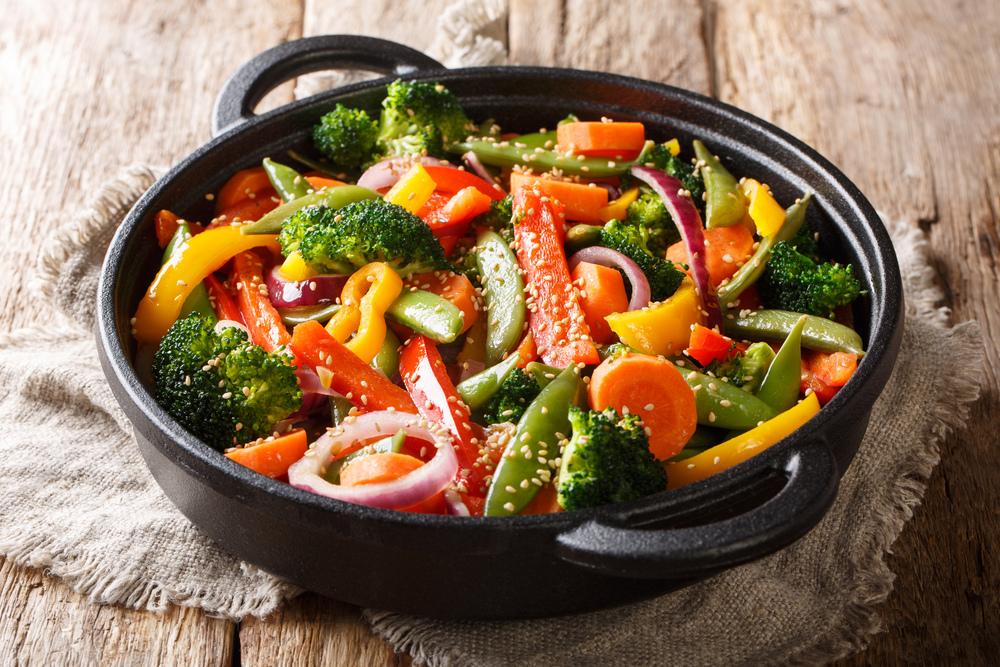 sautéed mixed vegetables in a skillet